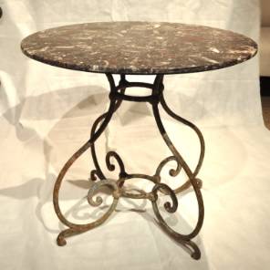 A French 19th century wrought iron gueridon with marble top